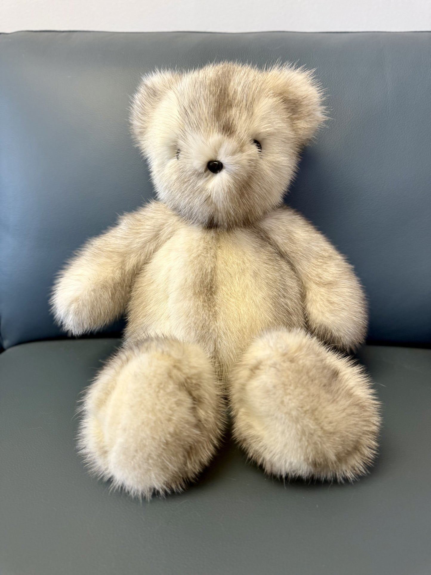 Mink Fur Bear Sitting On A Couch